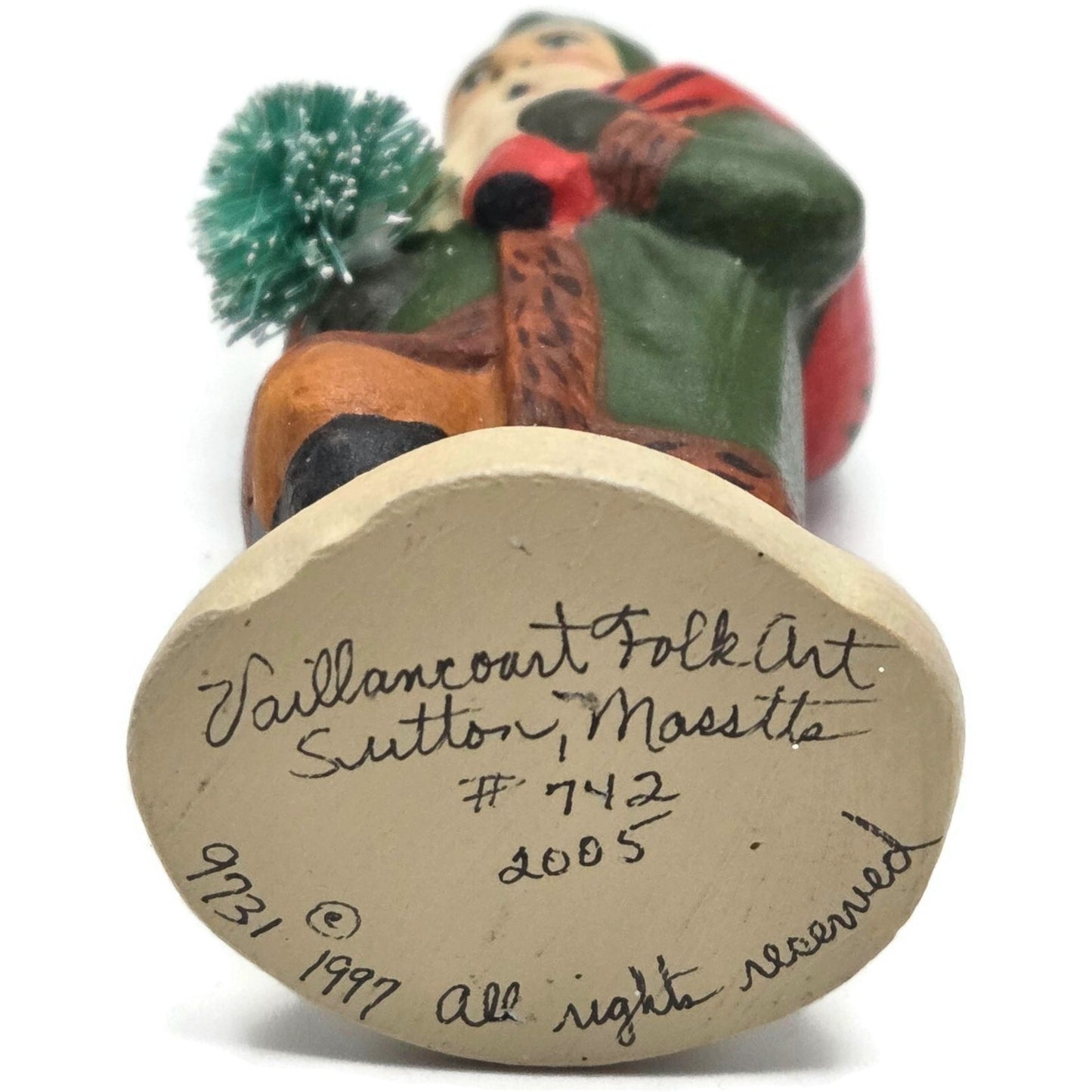Vaillancourt Small Green Father Christmas Trudging Thru Snow Christmas Figurine