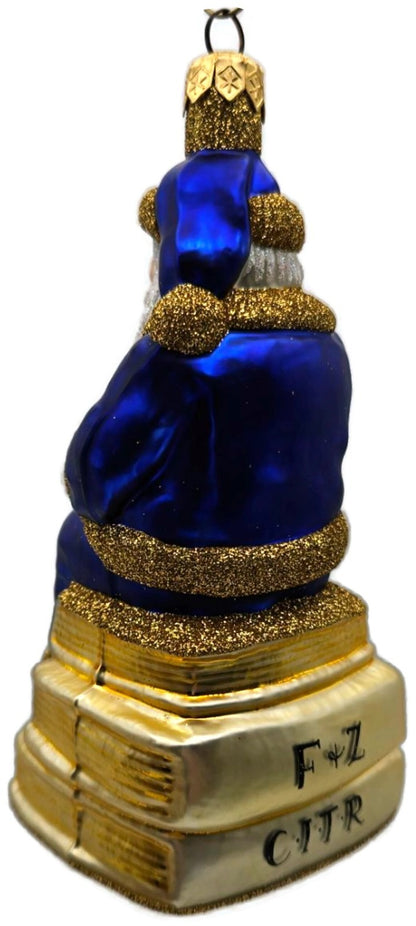 Patricia Breen Santa Reads Blue Glittered Top Of Books Christmas Ornament 99316