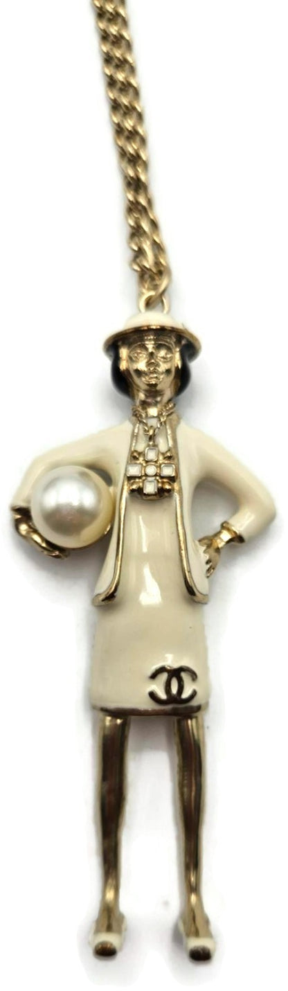 Chanel CC Logo B12A Coco Mademoiselle Figurine Charm Pendant Necklace Gold Pearl0