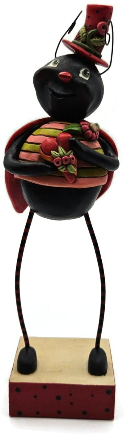 Janell Berryman Hugs and Kisses Pumpkinseeds Folk Art Enesco Ladybug Figurine0