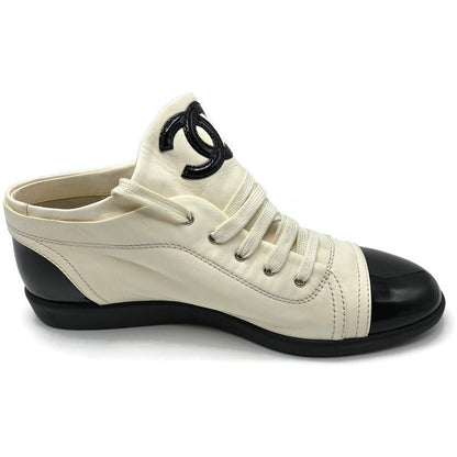 Chanel 14B Lace Up Sneakers White Black Cap Toe CC Logo Womens Size 41 New