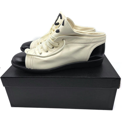 Chanel 14B Lace Up Sneakers White Black Cap Toe CC Logo Womens Size 41 New