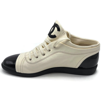 Chanel 14B Lace Up Sneakers White Black Cap Toe CC Logo Womens Size 41 New