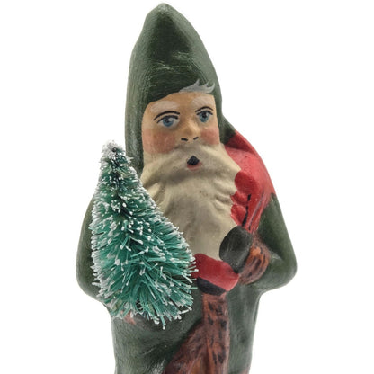 Vaillancourt Small Green Father Christmas Trudging Thru Snow Christmas Figurine